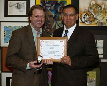 Joe Adams, President, Discovery Science Center, with Board Member Felix Rocha