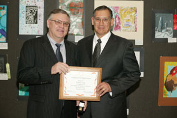 Donald L. Trigg, Associate Superintendent, Business Services, Santa Ana Unified, with Board Member Felix Rocha