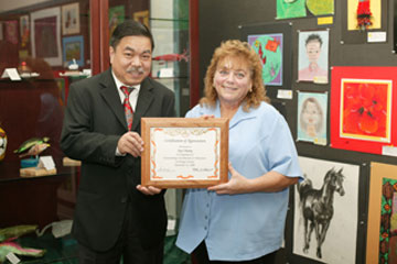 Board Member Dr. Long Pham with Joy Chaney, Teacher, Finley Elementary School, Westminster School District